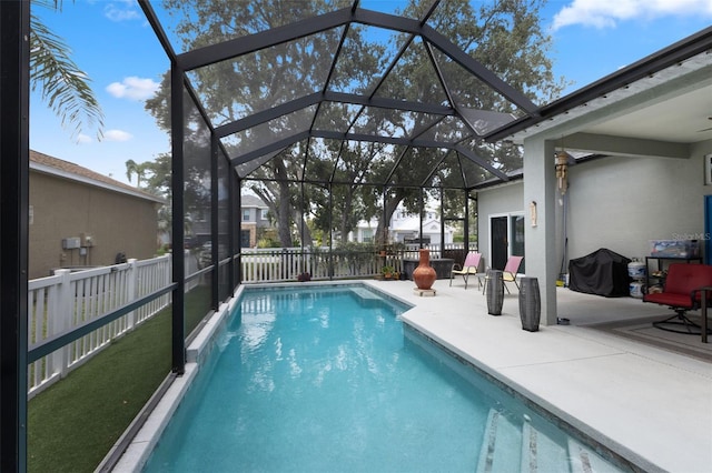 318 39th St NE, Bradenton, FL 34208 - view of swimming pool with a patio area, a fenced backyard, and glass enclosure
