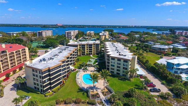 8779 Midnight Pass Rd Unit 506H, Sarasota, FL 34242 - aerial view of a pool, a large body of water, and apartment complex / building