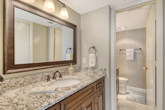 8779 Midnight Pass Rd Unit 506H, Sarasota, FL 34242 - bathroom with a textured ceiling, vanity, toilet, and tile patterned floors