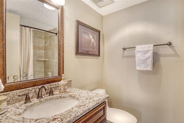 8779 Midnight Pass Rd Unit 506H, Sarasota, FL 34242 - full bathroom featuring vanity, toilet, curtained shower, and a textured ceiling