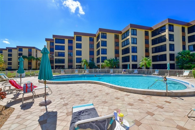 8779 Midnight Pass Rd Unit 506H, Sarasota, FL 34242 - community pool with a patio area