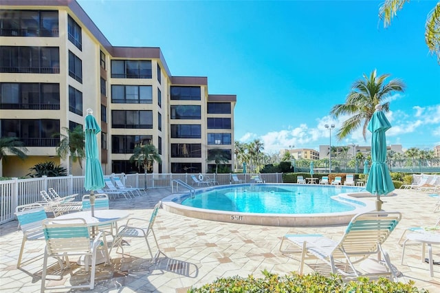 8779 Midnight Pass Rd Unit 506H, Sarasota, FL 34242 - community pool featuring a patio area