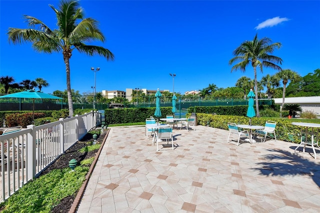 8779 Midnight Pass Rd Unit 506H, Sarasota, FL 34242 - view of patio / terrace featuring outdoor dining space