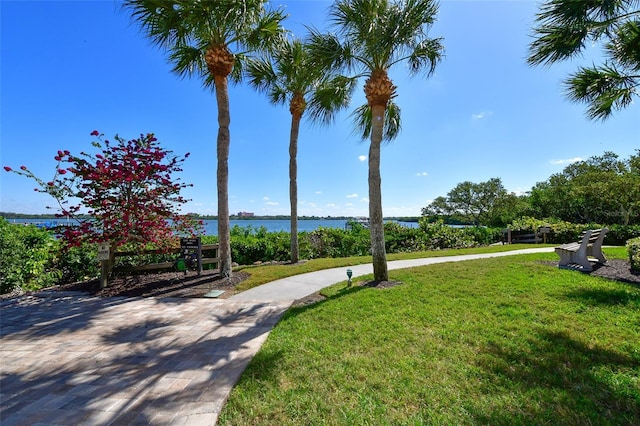 8779 Midnight Pass Rd Unit 506H, Sarasota, FL 34242 - view of green lawn with a water view