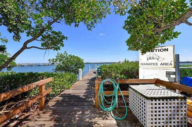 8779 Midnight Pass Rd Unit 506H, Sarasota, FL 34242 - dock area with a water view