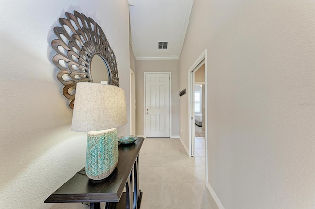 13710 Messina Loop Unit 201, Bradenton, FL 34211 - doorway to outside with ornamental molding, light tile patterned flooring, and baseboards