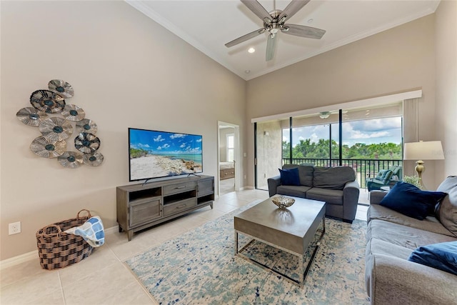 13710 Messina Loop Unit 201, Bradenton, FL 34211 - living area with ornamental molding, light tile patterned floors, baseboards, a ceiling fan, and a high ceiling