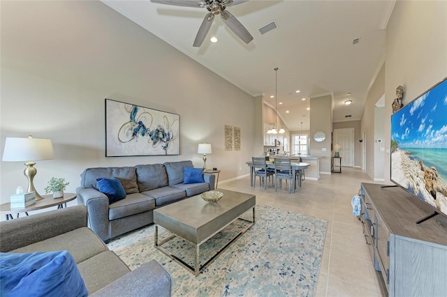 13710 Messina Loop Unit 201, Bradenton, FL 34211 - living room with light tile patterned flooring, a ceiling fan, baseboards, crown molding, and recessed lighting