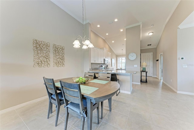 13710 Messina Loop Unit 201, Bradenton, FL 34211 - dining area featuring ornamental molding, baseboards, a chandelier, light tile patterned flooring, and recessed lighting