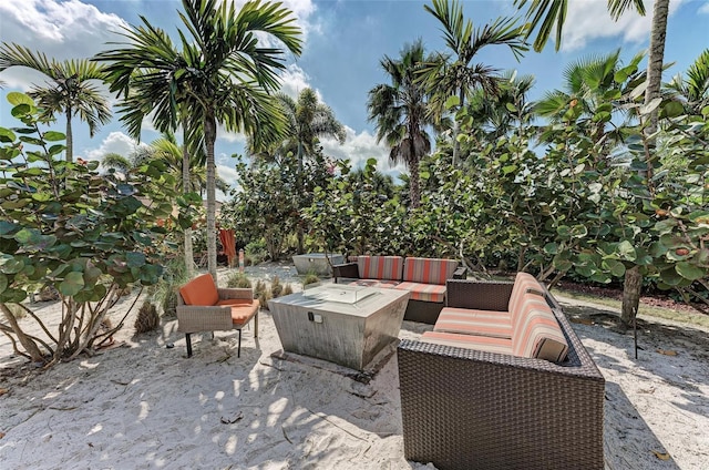 13710 Messina Loop Unit 201, Bradenton, FL 34211 - view of patio with an outdoor living space with a fire pit