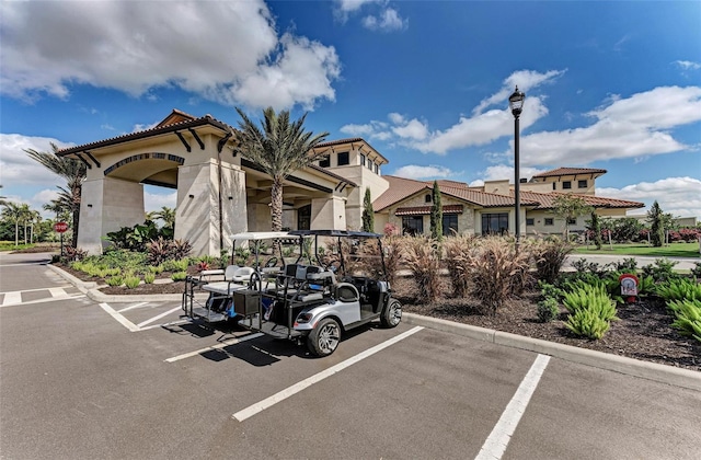 13710 Messina Loop Unit 201, Bradenton, FL 34211 - view of building exterior with uncovered parking