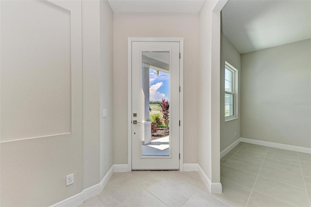 4210 Sea Marsh Pl, Parrish, FL 34219 - foyer featuring light tile patterned floors and baseboards