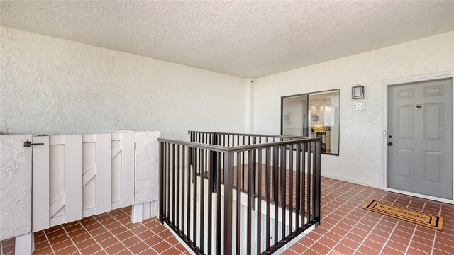1465 Gulf Of Mexico Dr Unit 502, Longboat Key, FL 34228 - doorway to property featuring a balcony