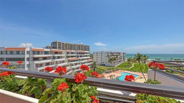 1465 Gulf Of Mexico Dr Unit 502, Longboat Key, FL 34228 - balcony featuring a water view and view of pool area