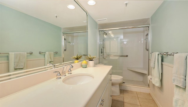 1465 Gulf Of Mexico Dr Unit 502, Longboat Key, FL 34228 - full bath featuring vanity, a shower stall, toilet, tile patterned floors, and recessed lighting