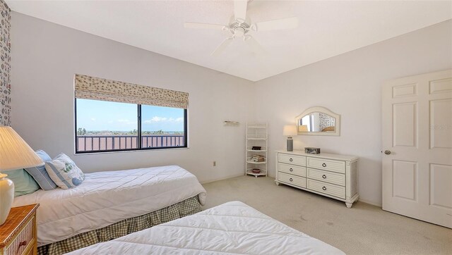 1465 Gulf Of Mexico Dr Unit 502, Longboat Key, FL 34228 - bedroom featuring light colored carpet and ceiling fan