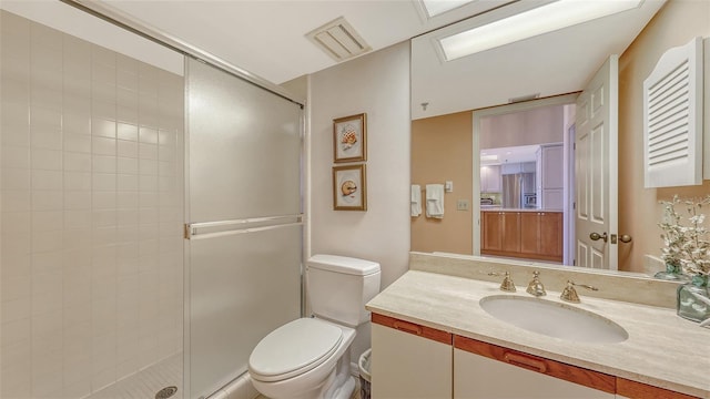 1465 Gulf Of Mexico Dr Unit 502, Longboat Key, FL 34228 - bathroom featuring a shower stall, vanity, and toilet