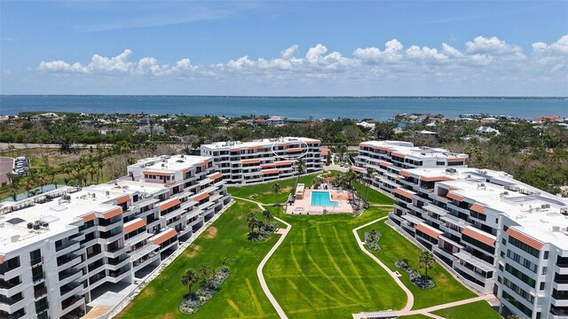 1465 Gulf Of Mexico Dr Unit 502, Longboat Key, FL 34228 - drone / aerial view of a nearby body of water and a pool