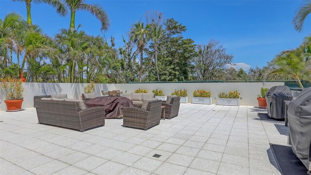 1465 Gulf Of Mexico Dr Unit 502, Longboat Key, FL 34228 - view of patio featuring an outdoor hangout area