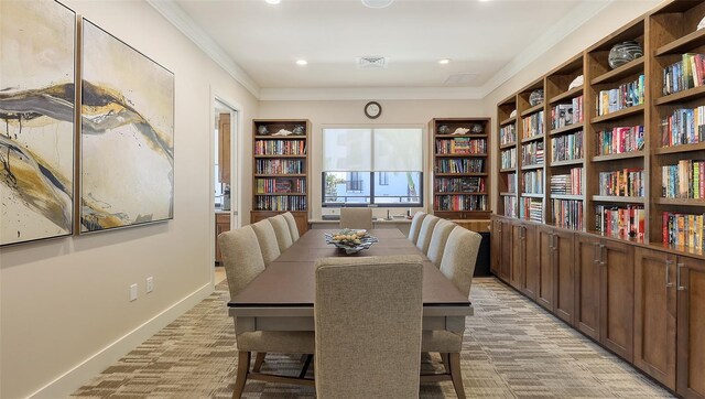 1465 Gulf Of Mexico Dr Unit 502, Longboat Key, FL 34228 - dining space featuring ornamental molding, light carpet, recessed lighting, and built in features