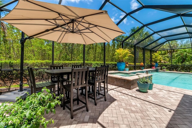932 Mangrove Edge Ct, Bradenton, FL 34208 - view of patio with a pool with connected hot tub and a lanai