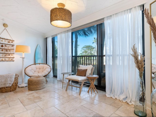 5880 Midnight Pass Rd Unit 207, Sarasota, FL 34242 - living area with ornamental molding and stone tile floors