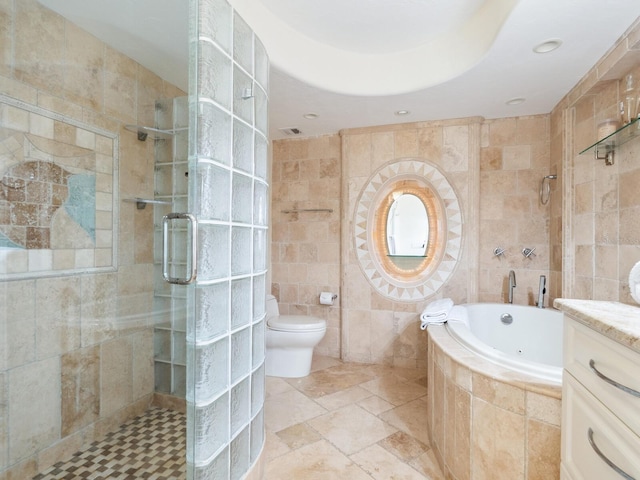 5880 Midnight Pass Rd Unit 207, Sarasota, FL 34242 - bathroom with tile walls, a shower stall, a jetted tub, vanity, and toilet