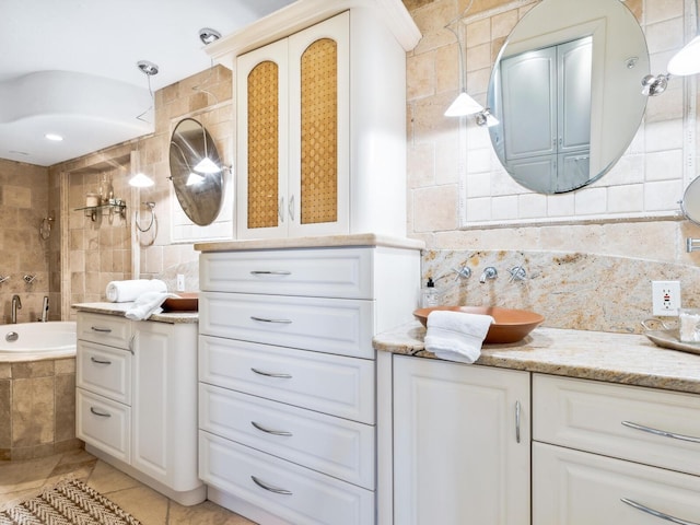 5880 Midnight Pass Rd Unit 207, Sarasota, FL 34242 - bathroom with vanity, tile patterned flooring, tasteful backsplash, and tiled shower / bath