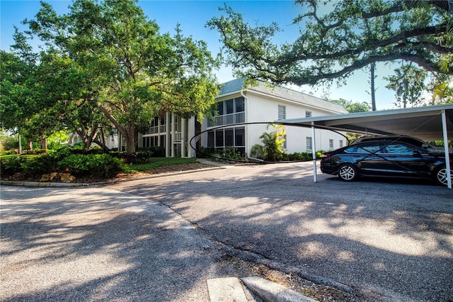 3745 Almeria Ave Unit 7S, Sarasota, FL 34239 - view of front of home with stucco siding and covered parking