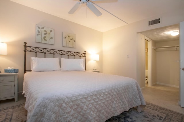 3745 Almeria Ave Unit 7S, Sarasota, FL 34239 - bedroom featuring ceiling fan, tile patterned floors, baseboards, and a closet