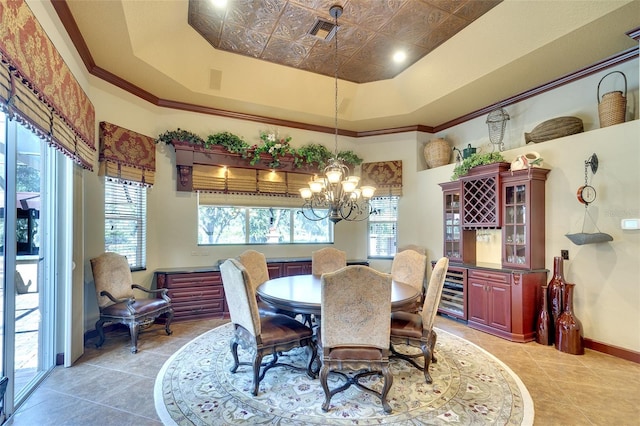 2901 Little Country Rd, Parrish, FL 34219 - dining area with a chandelier, light tile patterned flooring, baseboards, and a raised ceiling