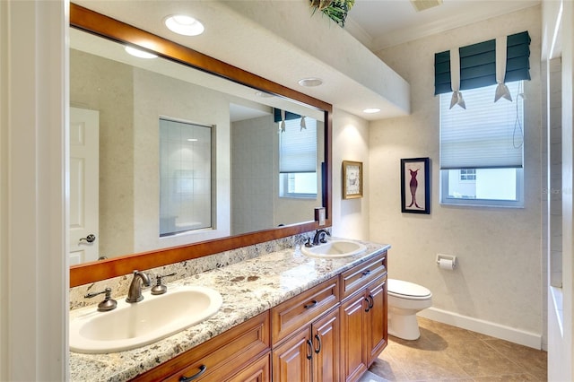 2901 Little Country Rd, Parrish, FL 34219 - full bathroom featuring double vanity, toilet, healthy amount of natural light, baseboards, and ornamental molding
