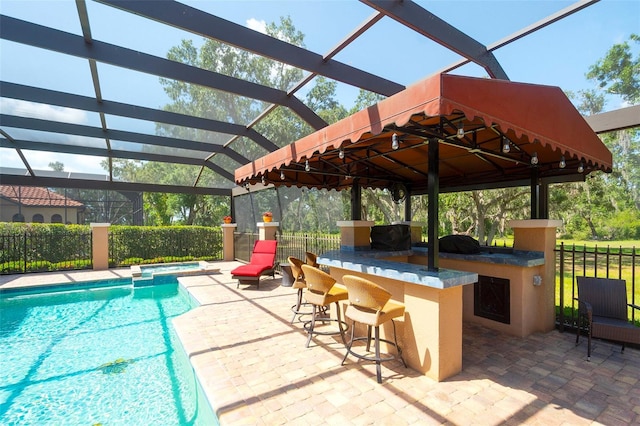 2901 Little Country Rd, Parrish, FL 34219 - view of swimming pool with glass enclosure, a patio, and a pool with connected hot tub