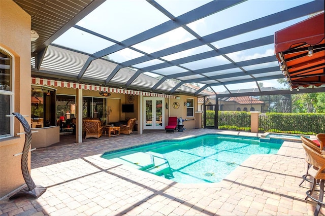 2901 Little Country Rd, Parrish, FL 34219 - view of pool featuring french doors, a patio, a pool with connected hot tub, and a lanai
