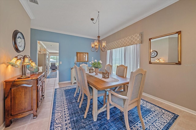 12322 Tall Pines Way, Lakewood Ranch, FL 34202 - dining area featuring a chandelier, light tile patterned flooring, crown molding, and baseboards