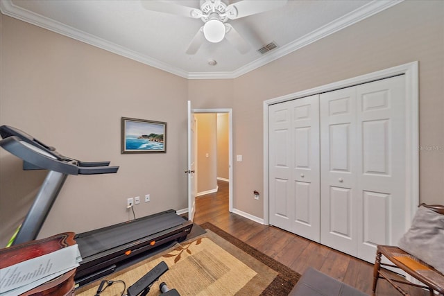 12322 Tall Pines Way, Lakewood Ranch, FL 34202 - workout area with wood finished floors, crown molding, ceiling fan, and baseboards