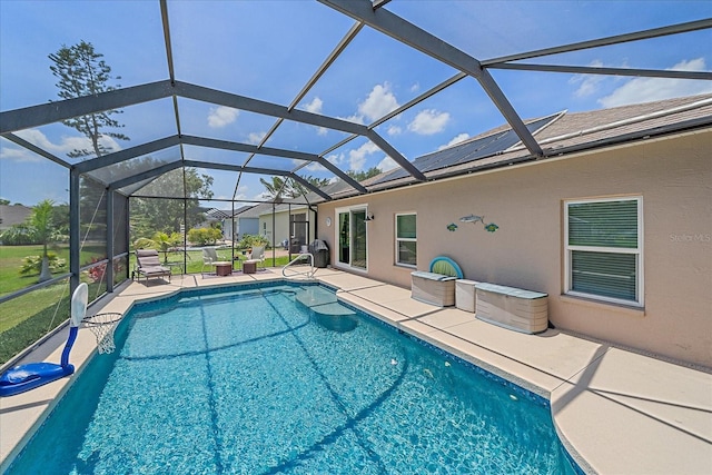 12322 Tall Pines Way, Lakewood Ranch, FL 34202 - swimming pool featuring a patio area and glass enclosure