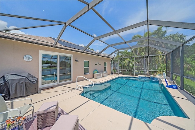 12322 Tall Pines Way, Lakewood Ranch, FL 34202 - swimming pool with a patio, a grill, and glass enclosure