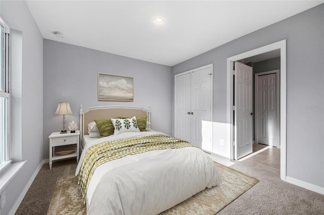10547 Kidron Ave, Englewood, FL 34224 - carpeted bedroom featuring a closet, baseboards, and recessed lighting