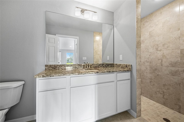 10547 Kidron Ave, Englewood, FL 34224 - bathroom with toilet, tiled shower, and vanity