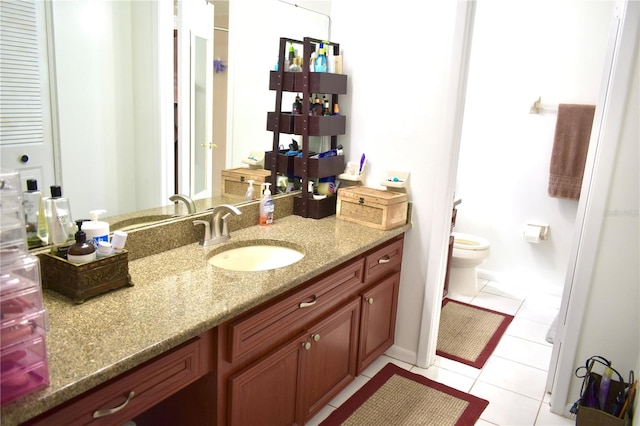6704 Rosemary Dr, Tampa, FL 33625 - full bathroom with vanity, tile patterned floors, and toilet
