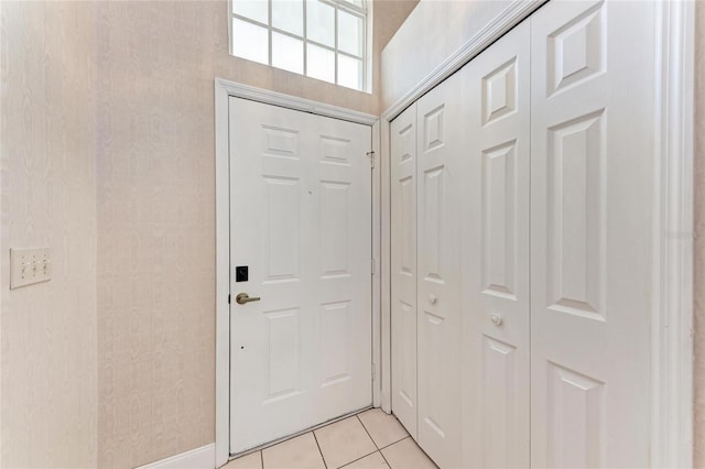 7023 Woodside Oaks Cir Unit 1, Sarasota, FL 34231 - entryway with light tile patterned flooring