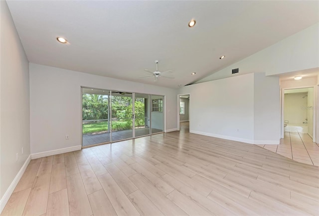 7023 Woodside Oaks Cir Unit 1, Sarasota, FL 34231 - empty room featuring ceiling fan, vaulted ceiling, light wood finished floors, baseboards, and recessed lighting