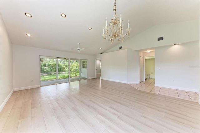 7023 Woodside Oaks Cir Unit 1, Sarasota, FL 34231 - unfurnished room featuring a ceiling fan, vaulted ceiling, light wood-style flooring, recessed lighting, and a chandelier