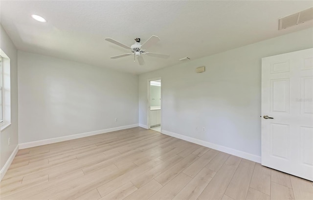 7023 Woodside Oaks Cir Unit 1, Sarasota, FL 34231 - spare room with light wood-style flooring, a ceiling fan, baseboards, and recessed lighting