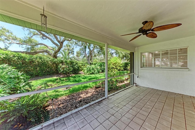 7023 Woodside Oaks Cir Unit 1, Sarasota, FL 34231 - unfurnished sunroom featuring ceiling fan
