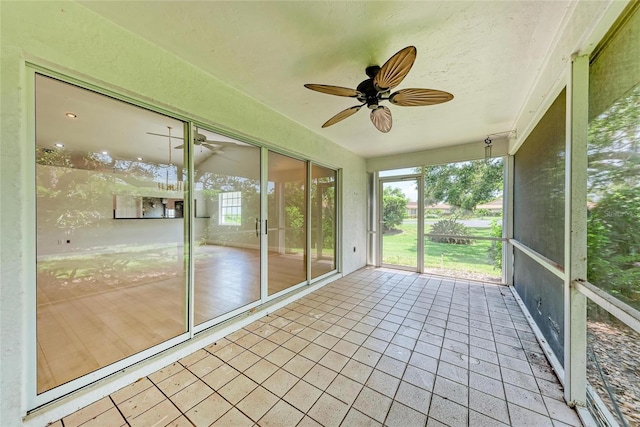 7023 Woodside Oaks Cir Unit 1, Sarasota, FL 34231 - unfurnished sunroom with a ceiling fan