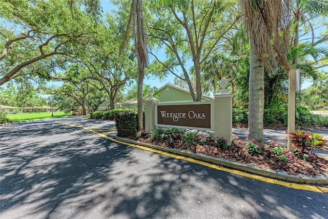 7023 Woodside Oaks Cir Unit 1, Sarasota, FL 34231 - view of community / neighborhood sign