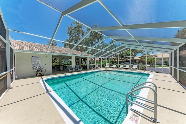 7023 Woodside Oaks Cir Unit 1, Sarasota, FL 34231 - outdoor pool featuring a patio area and a lanai