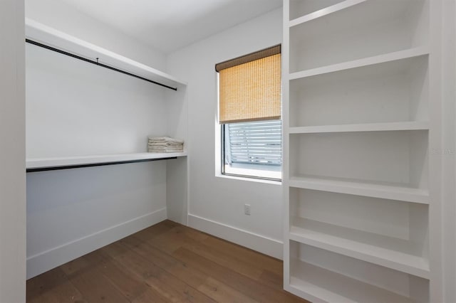 401 39th St, Holmes Beach, FL 34217 - walk in closet with wood finished floors